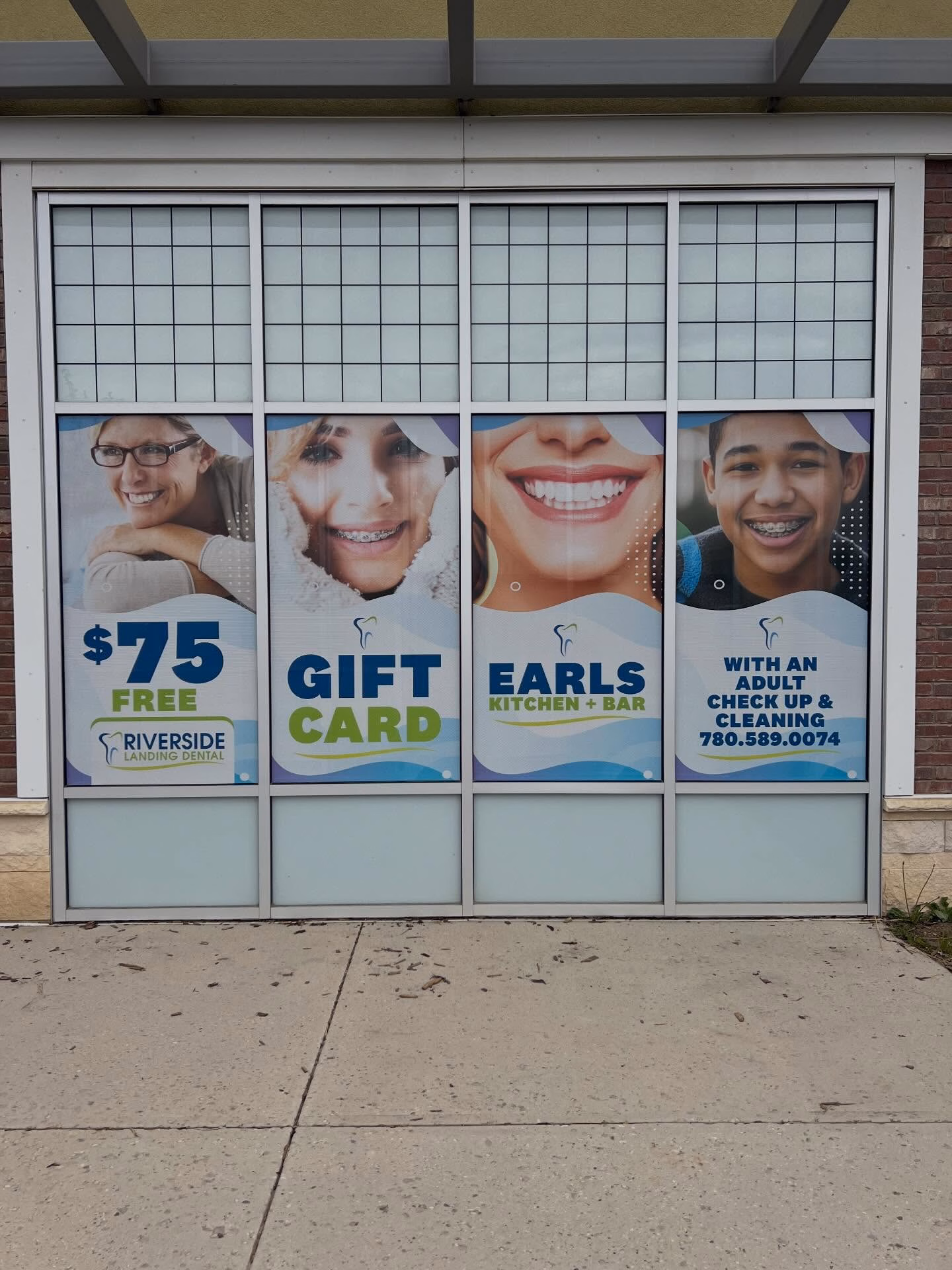 Custom window signs in Edmonton featuring branded graphics on glass